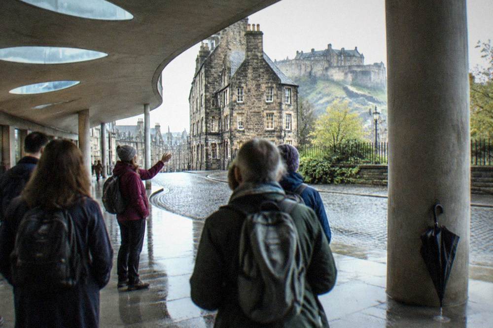 The garden lobby walkway of the Scottish Parliament with its curved concrete vaults and leaf-shaped skylights
