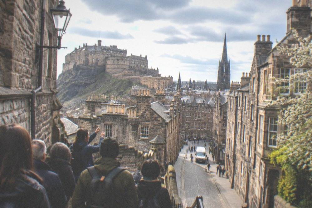 Cobbled Royal Mile street with historic buildings on both sides
